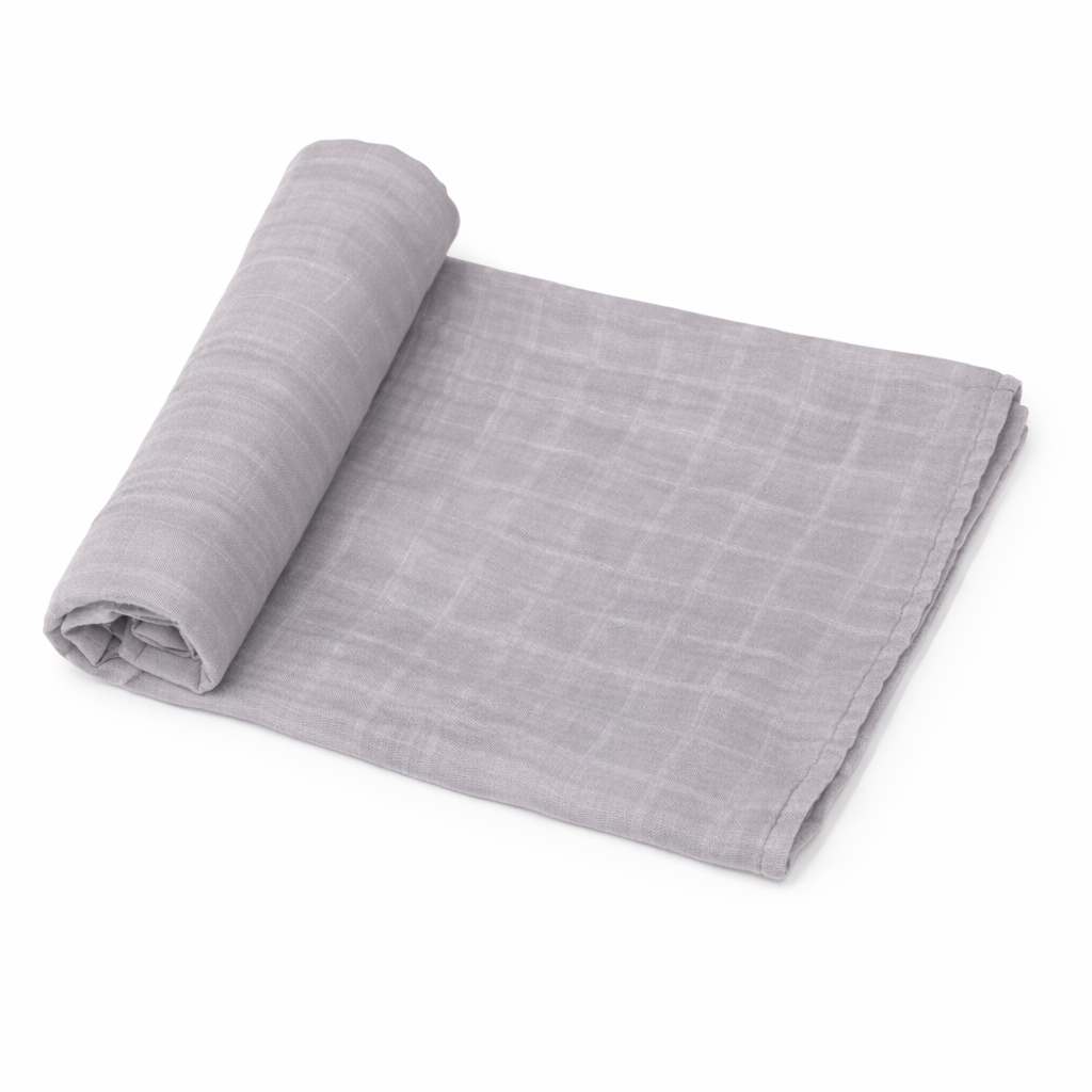 medium gray organic muslin baby swaddle blanket rolled on white background
