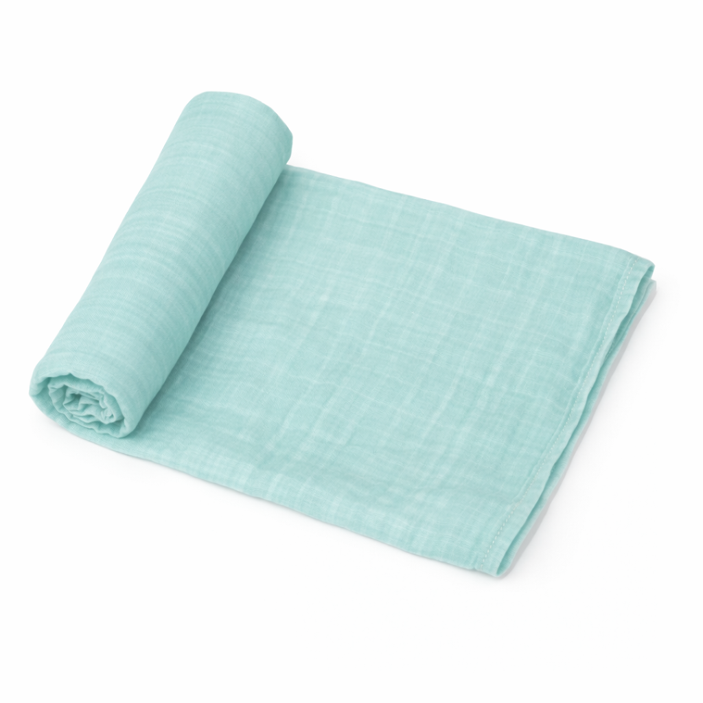 airy blue organic muslin baby swaddle blanket rolled on white background