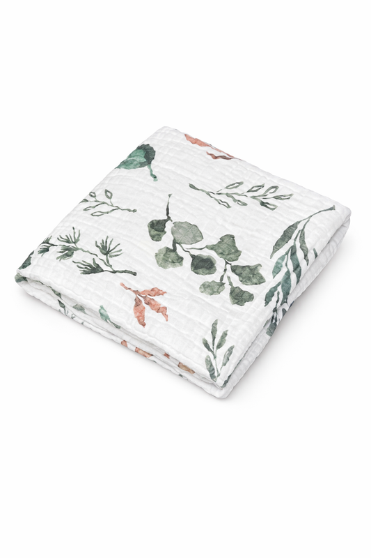 burpnbaby organic muslin baby blanket with botanical leaf pattern folded